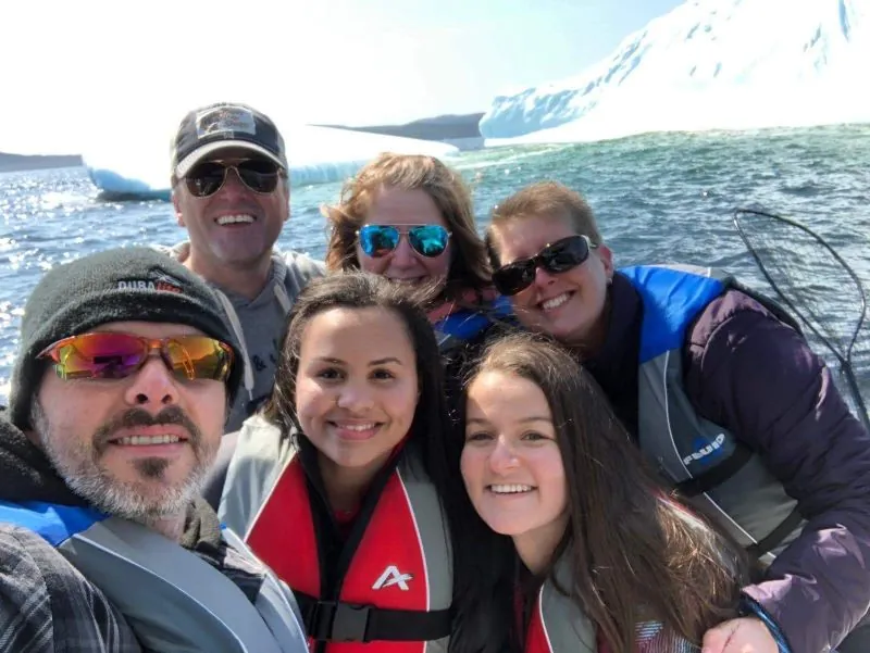 selfie with an iceberg, host family and student